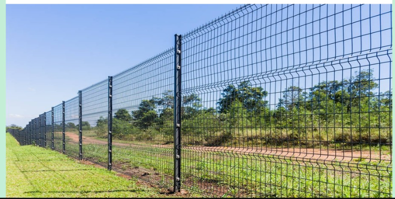 Hot dipped galvanized panel fencing installed along a property boundary